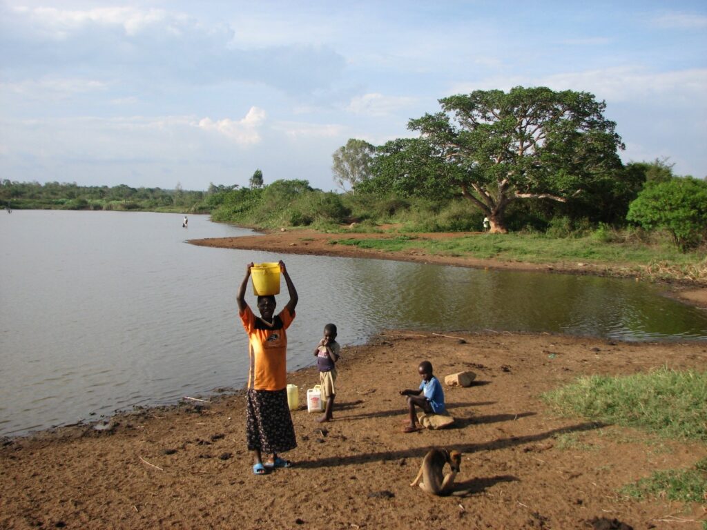 A woman collecting water in Kenya