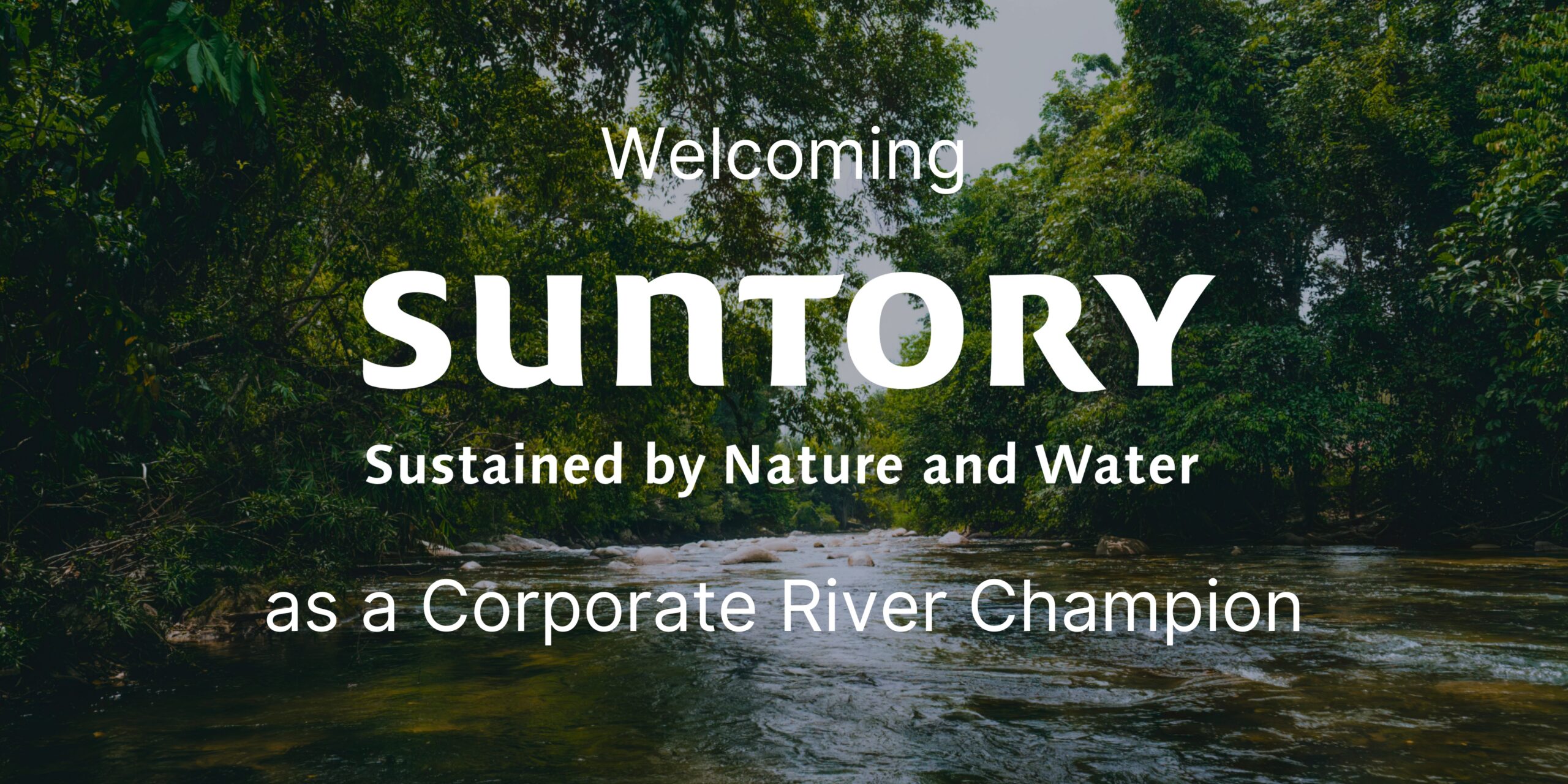 Photo of an Australian river, overlayed with the text "welcoming Suntory as a Corporate River Champion"